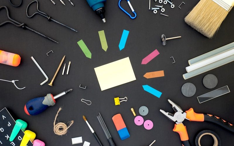 Vendra electronics repair shop software — technician repairing devices