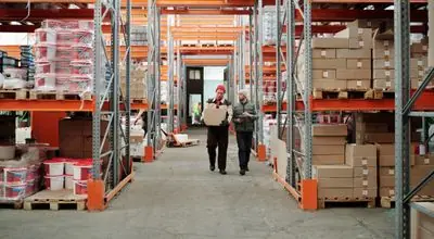 Wholesale warehouse with stacked goods