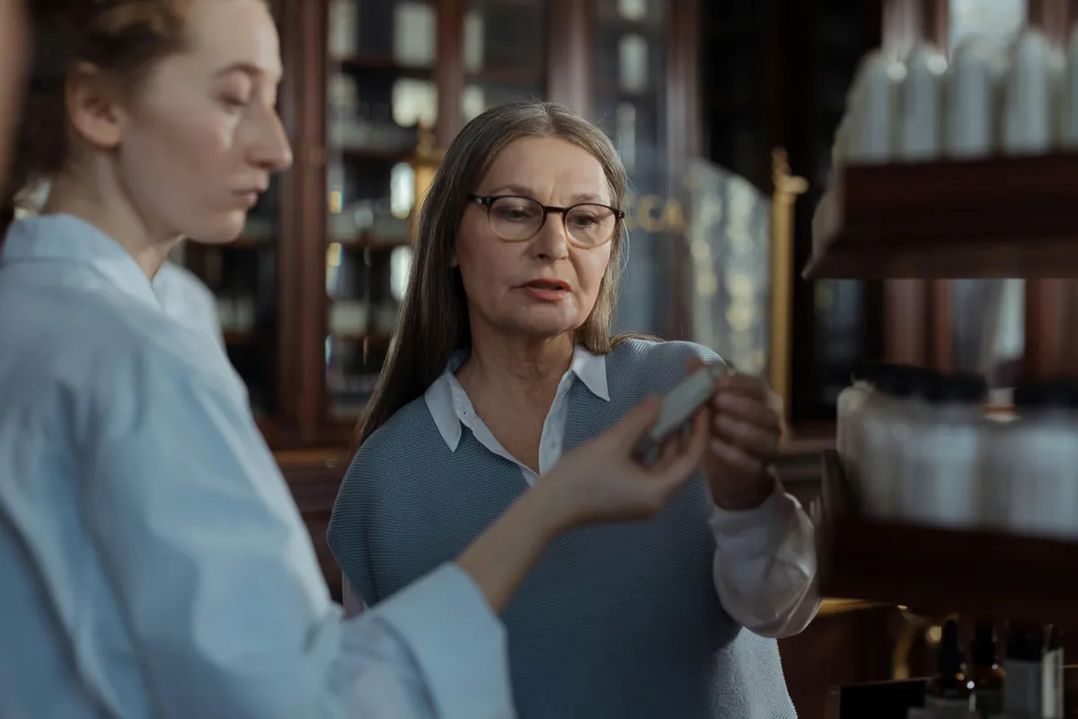 Pharmacy management software — pharmacist managing medicine inventory and dispensing